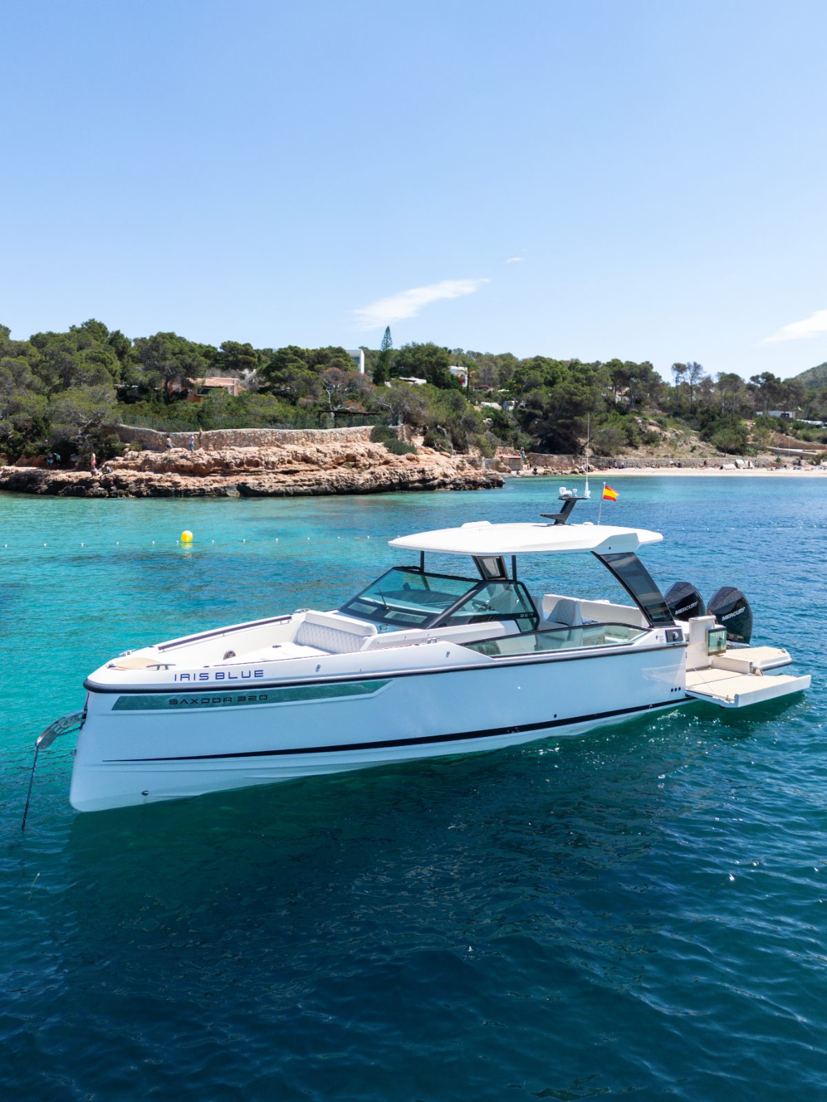 Saxdor 320 Iris Blue anchored off Ibiza